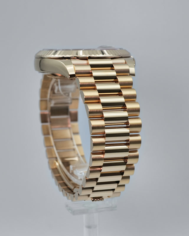 Rolex 228235 Day Date 40 18K Rose Gold with Chocolate Roman Dial