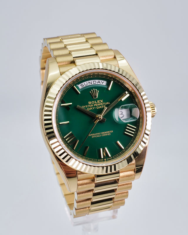 Rolex 228238 Day Date 40 18K Yellow Gold with Money Geen Dial
