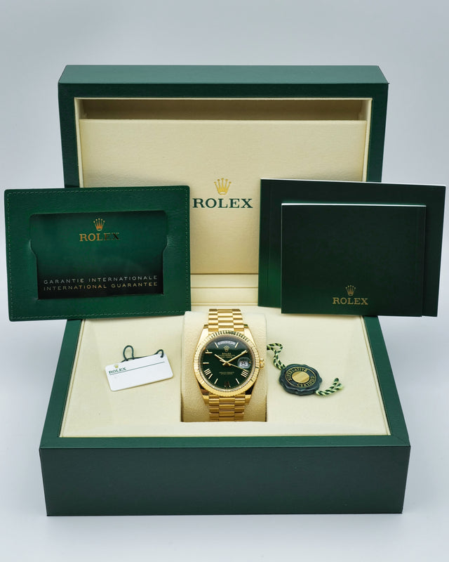 Rolex 228238 Day Date 40 18K Yellow Gold with Money Geen Dial