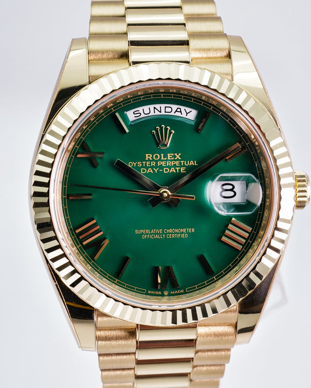 Rolex 228238 Day Date 40 18K Yellow Gold with Money Geen Dial