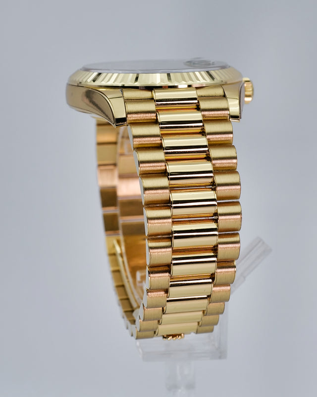 Rolex 228238 Day Date 40 18K Yellow Gold with Money Geen Dial