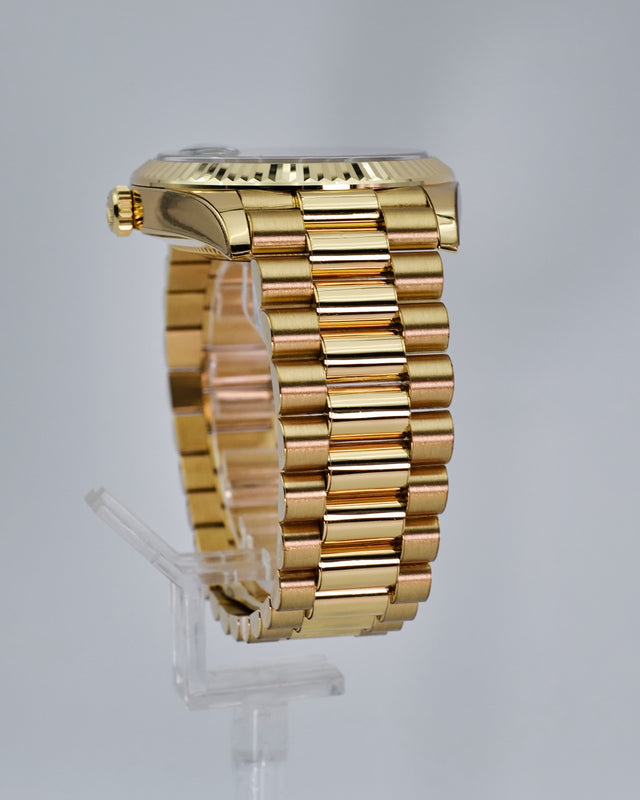 Rolex 228238 Day Date 40 18K Yellow Gold with Money Geen Dial