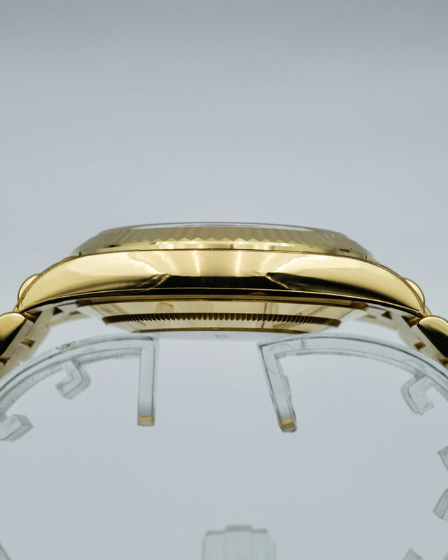 Rolex 228238 Day Date 40 18K Yellow Gold with Money Geen Dial