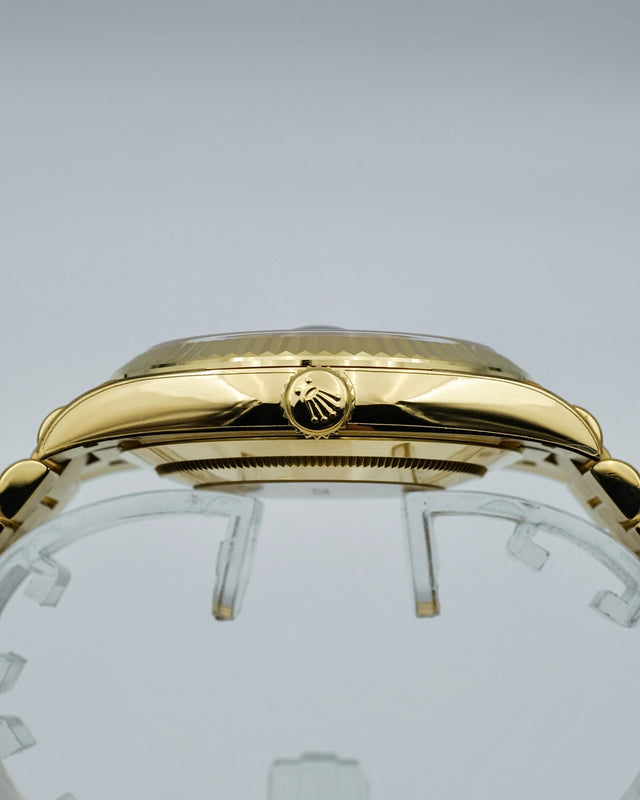 Rolex 228238 Day Date 40 18K Yellow Gold with Money Geen Dial