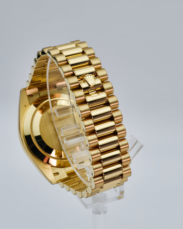 Rolex 228238 Day Date 40 18K Yellow Gold with Money Geen Dial