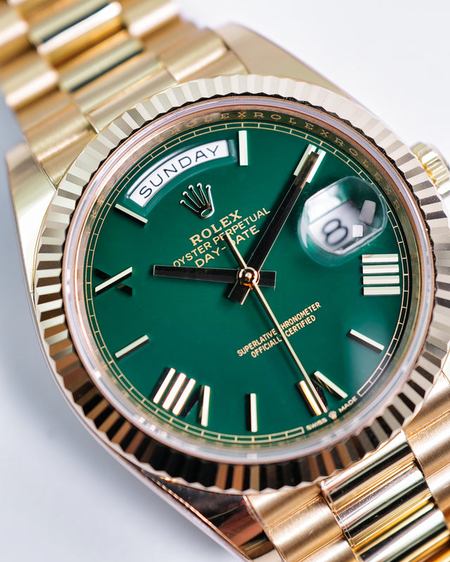 Rolex 228238 Day Date 40 18K Yellow Gold with Money Geen Dial