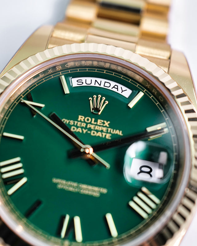 Rolex 228238 Day Date 40 18K Yellow Gold with Money Geen Dial