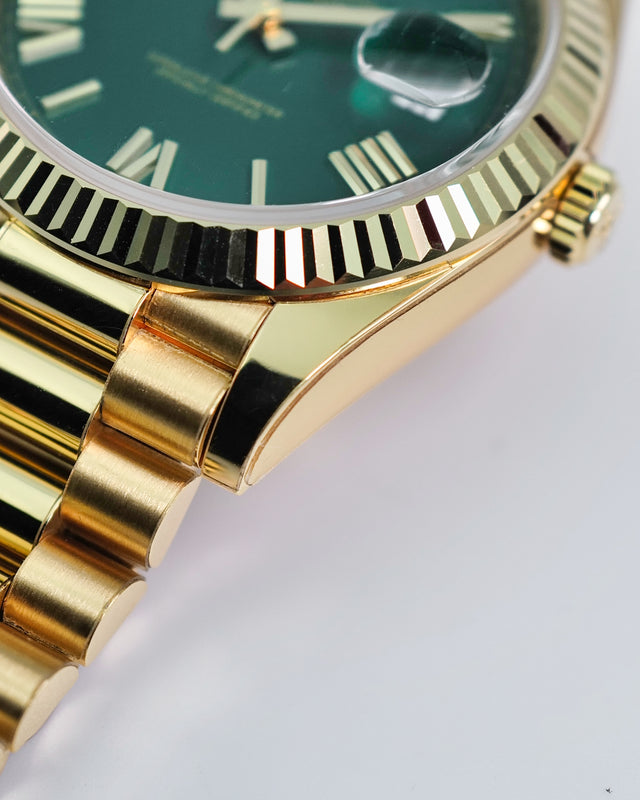 Rolex 228238 Day Date 40 18K Yellow Gold with Money Geen Dial