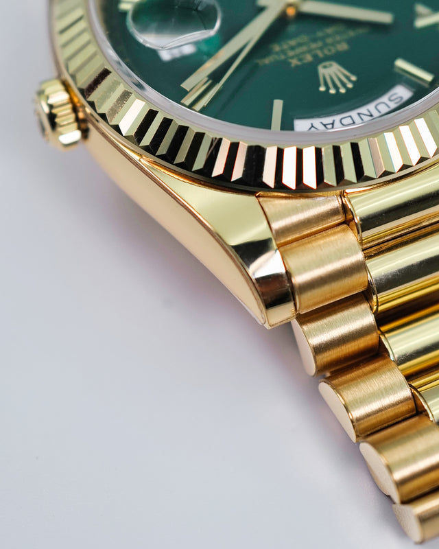 Rolex 228238 Day Date 40 18K Yellow Gold with Money Geen Dial