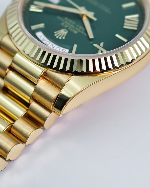 Rolex 228238 Day Date 40 18K Yellow Gold with Money Geen Dial