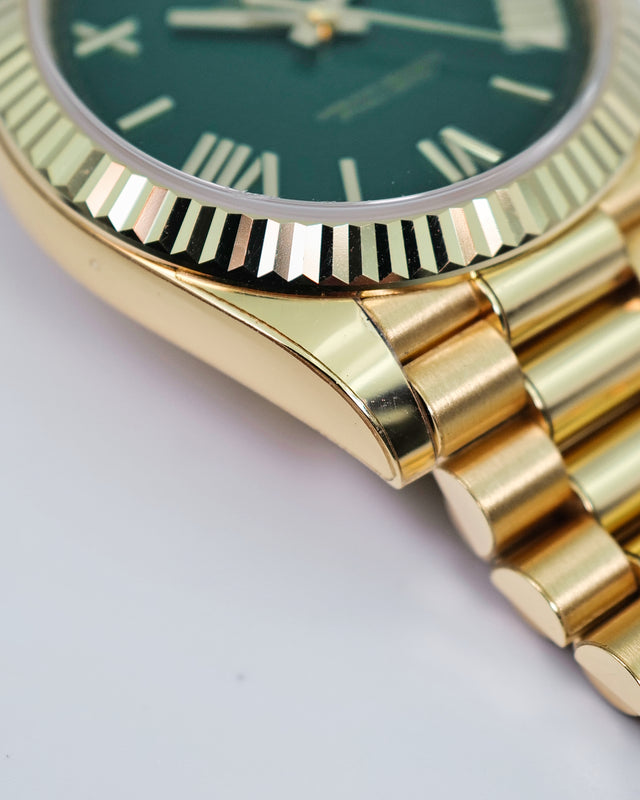Rolex 228238 Day Date 40 18K Yellow Gold with Money Geen Dial