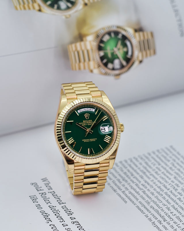 Rolex 228238 Day Date 40 18K Yellow Gold with Money Geen Dial